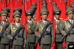 FILE - North Korean soldiers parade in Pyongyang, North Korea, Oct. 10, 2015.