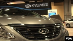 FILE - A new Hyundai under the lights at an auto show.