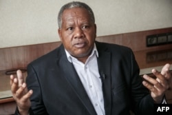 FILE —Malagasy politician and member of the collective of opposition candidates Roland Ratsiraka talks during an interview in Antananarivo, on November 13, 2023.
