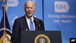 President Joe Biden speaks about the COVID-19 variant named omicron during a visit to the National Institutes of Health, Thursday, Dec. 2, 2021, in Bethesda, Md. (AP Photo/Evan Vucci)