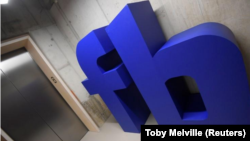 FILE - A Facebook logo in its London office on December 4, 2017. (REUTERS / Toby Melville)