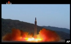 This image made from video of a news bulletin aired by North Korea's KRT on May 15, 2017, shows what was said to be the launch of the Hwasong-12 missile at an undisclosed location in North Korea.