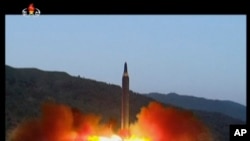 This image made from video of a news bulletin aired by North Korea's KRT on May 15, 2017, shows what was said to be the launch of the Hwasong-12 missile at an undisclosed location in North Korea.