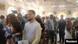 Convicted cocaine smuggler Jos Leijdekkers attends a church service in Tihun, Sierra Leone, Jan. 1, 2025, in this screen grab obtained from a social media video. First Lady Fatima Maada Bio via Facebook/via REUTERS.