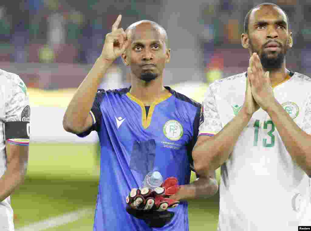 Comoros' Chaker Alhadhur who is a defender plays goalie as their goalkeepers did not make the match squad due to coronavirus disease.