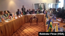 FILE - Members of a mediation team for the conflict in South Sudan are seen meeting in Addis Ababa, Ethiopia, July 23, 2015.