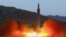 This image made from video of a news bulletin aired by North Korea's KRT on May 15, 2017, shows what was said to be the launch of the Hwasong-12 missile at an undisclosed location in North Korea. 