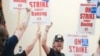 FILE - People react to an announcement that union members rejected a proposed Boeing contract and will go on strike, following voting results at their union hall in Seattle, Washington, on Sept. 12, 2024.