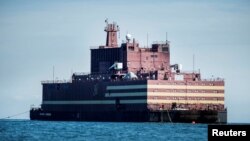 The Russian "Academy Lomonosov," the world's first floating nuclear power plant, passes Langeland island, while heading for Murmansk in northwestern Russia, May 4, 2018. China plans to power some of its claimed islets in the South China Sea with floating nuclear power stations of its own.