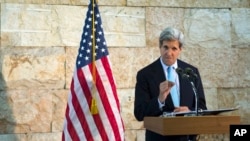 U.S. Secretary of State John Kerry speaks about his trip to the Middle East during a news conference in Tel Aviv, Israel, June 30, 2013. 