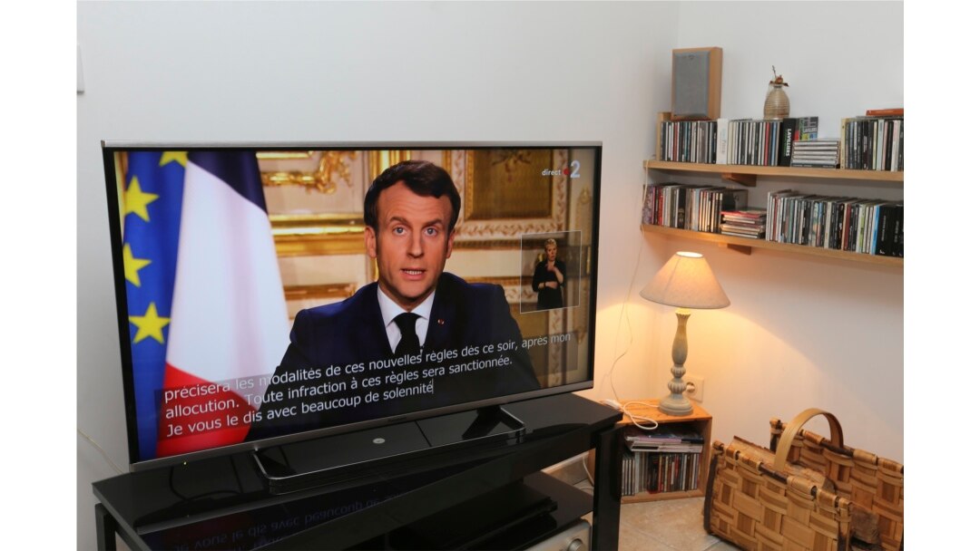 French President Emmanuel Macron speaks during a television address, Monday, March 16, 2020 in Ciboure, southwestern France. For most people, the new coronavirus causes only mild or moderate symptoms.