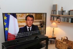 French President Emmanuel Macron speaks during a television address, Monday, March 16, 2020 in Ciboure, southwestern France. For most people, the new coronavirus causes only mild or moderate symptoms.