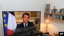 French President Emmanuel Macron speaks during a television address, Monday, March 16, 2020 in Ciboure, southwestern France.