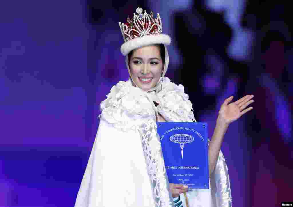 Miss International Bea Rose Santiago of the Philippines waves on stage after being crowned Miss International Beauty Pageant 2013 in Tokyo, Japan.