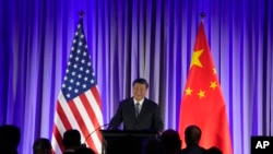 中国国家主席习近平2023年11月15日在旧金山出席美国商界主办的晚宴并发表讲话。（法新社）