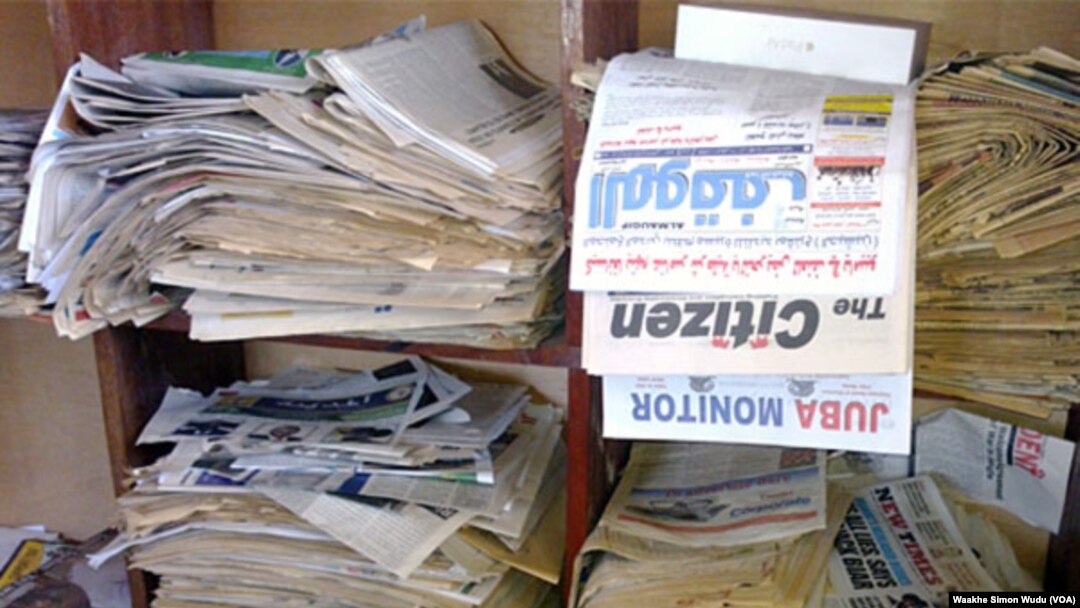 FILE - Stacks of South Sudanese newspapers sit on shelves in the office of the Association for Media Development in South Sudan (AMDISS) in Juba.