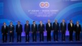 From left, Secretary General of the Association of Southeast Asian Nations (ASEAN) Le Luong Minh, Brunei's Sultan Hassanal Bolkiah, Cambodian Prime Minister Hun Sen, Indonesian President Joko Widodo, Laos Prime Minister Thongloun Sisoulith, Russian Presid