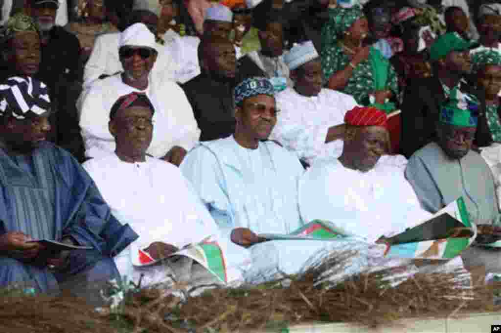 Muhammadu Buhari, former military ruler and presidential aspirant, centre, and other party leaders attends the All Progressive Congress party convention in Lagos, Nigeria,Thursday, April. 18, 2013.