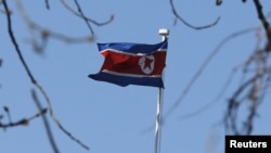 FILE - A North Korean flag is pictured at its embassy in Beijing.