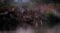  Refugees, who have fled a flare-up in fighting between the Myanmar army and insurgent groups and settled temporarily on the Moei River Bank, are seen on the Thai-Myanmar border, in Mae Sot, Thailand, Jan. 7, 2022. 