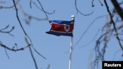 FILE - A North Korean flag is pictured at its embassy in Beijing.