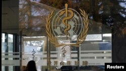 FILE PHOTO: A logo is pictured on the World Health Organization headquarters in Geneva