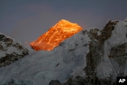 FILE - In this Nov. 12, 2015, file photo, Mt. Everest is seen from the way to Kalapatthar in Nepal.