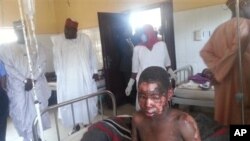 Une victime d'extrémistes présumés ayant attaqué le village de Kawuri, au Nigéria 