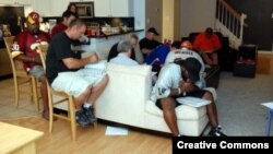 FILE -- Many fantasy football leagues hold draft parties, when league players get together to select their team’s players before the start of the season. (Photo by Flickr user David Clow via Creative Commons license)