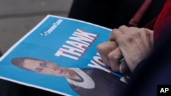 An attendee holds onto a ‘thank you’ poster during a public remembrance of Justice Ginsburg, a former Brooklynite. Brooklyn Borough President Eric Adams is calling on Mayor Bill de Blasio to rename the Municipal Building in honor of Justice Ginsburg.