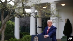 President Donald Trump speaks during a coronavirus task force briefing in the Rose Garden of the White House, March 29, 2020, in Washington. 
