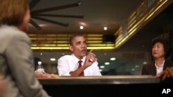 El presidente Barack Obama durante una reunión con pequeños empresarios en Taylor Gourmet en la calle U en Washington.