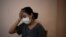 Rachelle Boumelhem reacts during an interview in her damaged beauty salon in Beirut, Lebanon, Aug. 10, 2020.