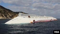 Los buzos retomaron las búsqueda en el Costa Concordia.