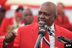 FILE - Botswana's President Mokgweetsi Masisi delivers a speech in Kang, Botswana, April 5, 2019.