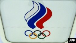 A picture shows the logo of the Russian Olympic Committee (ROC) inside its headquarters in Moscow on December 17, 2020, hours before the Court of Arbitration for Sport (CAS) is to deliver its verdict over Russia ban from international sports imposed follo