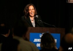 FILE - U.S. Sen. Kamala Harris, a candidate for the 2020 Democratic presidential nomination, addresses labor leaders at the California Labor Federal and State Building and Construction Trades Council Legislative Conference Dinner, April 1, 2019, in Sacramento.