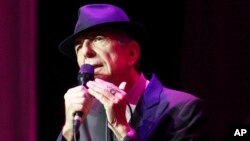 FILE - Leonard Cohen performs at The Fabulous Fox Theatre in Atlanta, March 22, 2013. Cohen, the gravelly-voiced Canadian singer-songwriter died Nov. 10, 2016, at age 82.