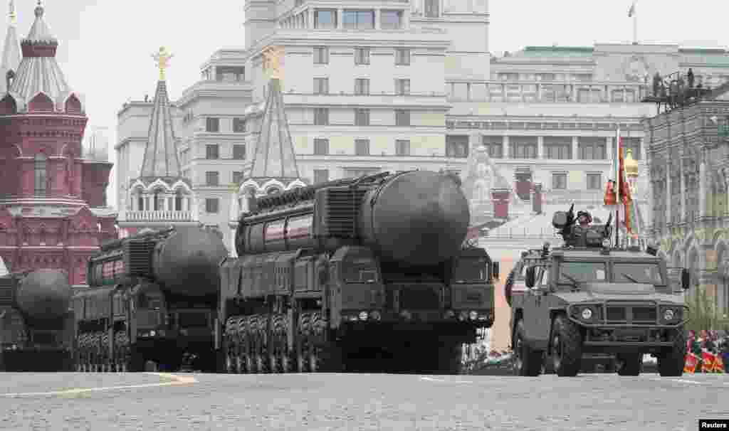 Russian servicemen transport Yars RS-24 intercontinental ballistic missile systems during the Victory Day parade, which marks the anniversary of the victory over Nazi Germany in World War Two, in Red Square in Moscow, Russia.