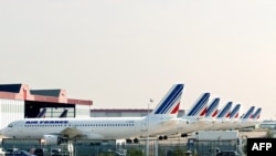 Vue partielle de l'aire de stationnement des avions d'Air France, le 06 septembre 2002 à l'aéroport de Roissy, en France. (Photo: JACK GUEZ / AFP)