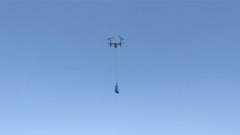 Walmart's drone delivery system is shown during a demonstration of the system. (Walmart)