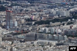 FILE - An aerial view is seen of the construction site of the new Paris courthouse in the urban development zone of Clichy–Batignolles, northwest of Paris, July 14, 2016.