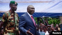 Central African Republic's new President Michel Djotodia speaks to his supporters at a rally in favor of the Seleka rebel coalition in downtown Bangui Mar. 30, 2013.