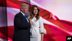 Republican presidential candidate Donald Trump gives a thumbs up after his wife Melania spoke during the Republican National Convention, Monday, July 18, 2016, in Cleveland. (AP Photo/Evan Vucci)