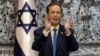 FILE - Israel's President Isaac Herzog speaks at the president's residence in Jerusalem, July 7, 2021. Israel's figurehead president will make the first visit to the United Arab Emirates by the country's head of state next Sunday, his office said.