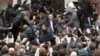Putin Foe Navalny Defiant as Trial Opens in Russia