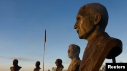 FILE—Bronze busts of former leaders of South Africa Paul Kruger, JBM Hertzog, DF Malan, JG Strydom and Hendrik Verwoerd, are displayed in the tiny whites-only town of Orania, in the Northern Cape province of South Africa, May 27, 2024.