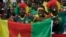 Cameroon's supporters chant ahead of the African Cup of Nations Group A soccer match between Cameroon and Gabon at the Stade de l'Amitie, in Libreville, Gabon, Sunday, Jan. 22, 2017.