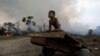 Fire Hazard: Children Struggle to Breathe as Smoke Chokes Amazon City