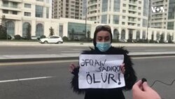 Sevinc Sadıqova Əfqan Sadıqovun həbsinə etiraz olaraq yolu bağlayıb